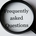 Magnifying glass over the words Frequently Asked Questions