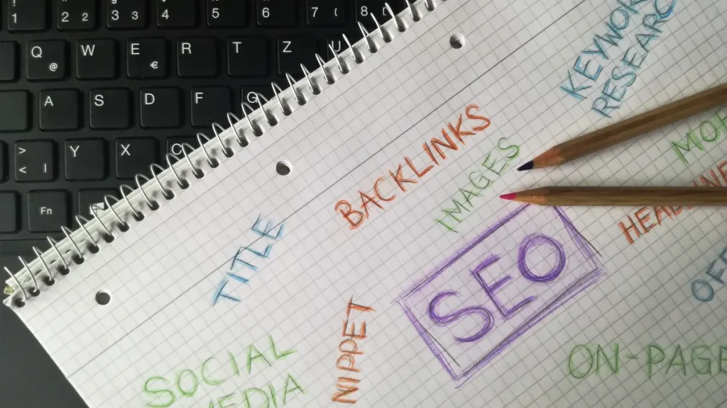 SEO keywords and backlinks sketched in a notebook
